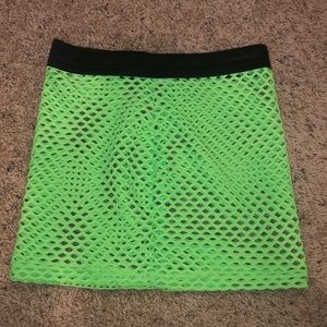 I Heart Raves two piece fishnet skirt and top.